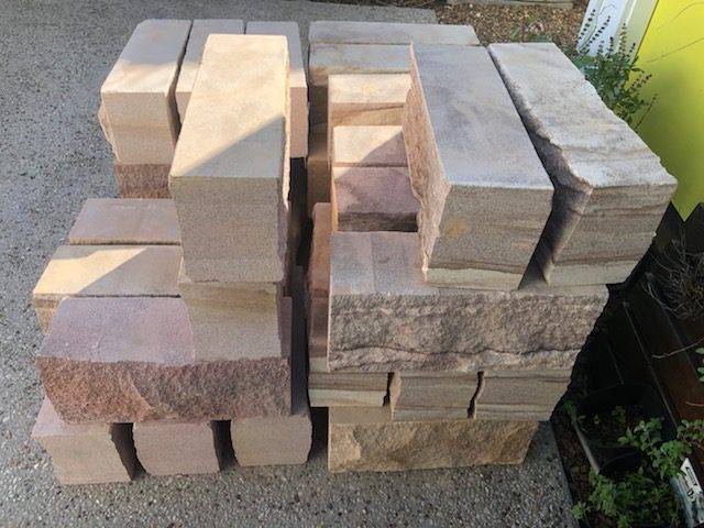 Sandstone garden edging brick installation in Brisbane garden Sandstone garden edging brick installation in Brisbane garden