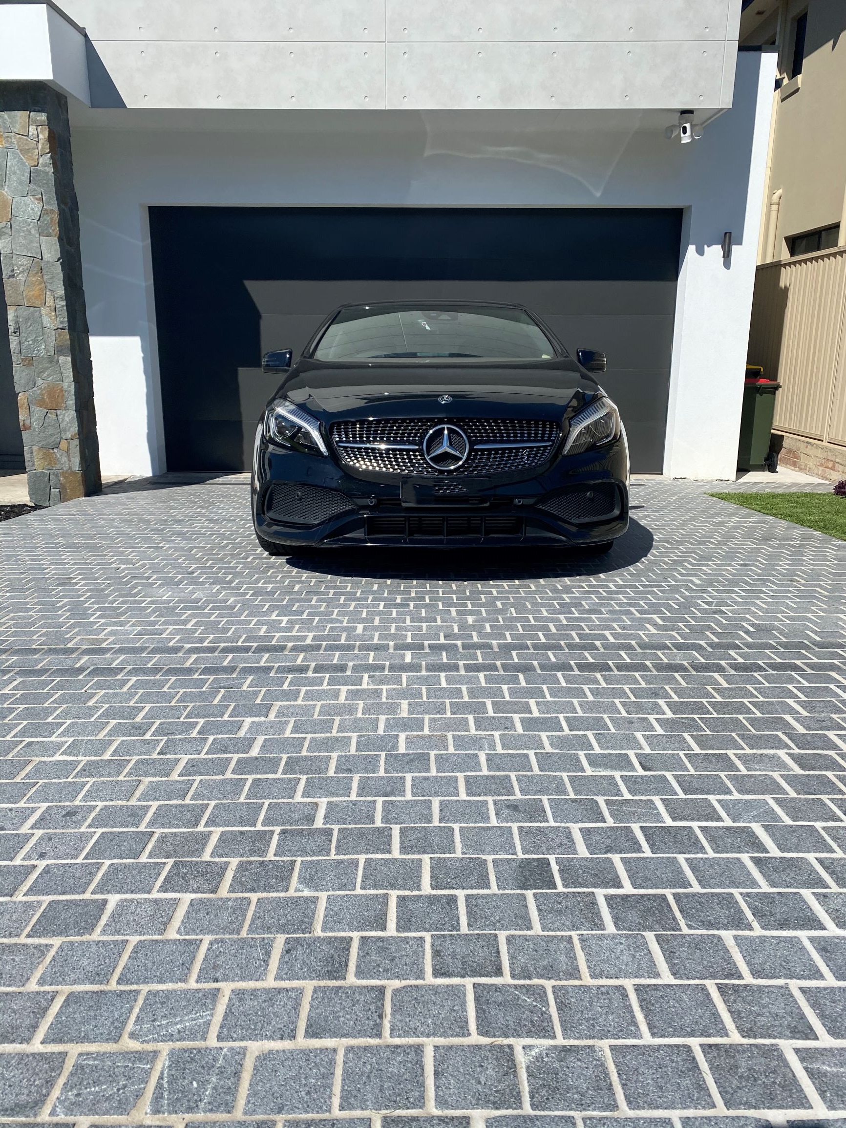 Sable granite cobblestone driveway close-up