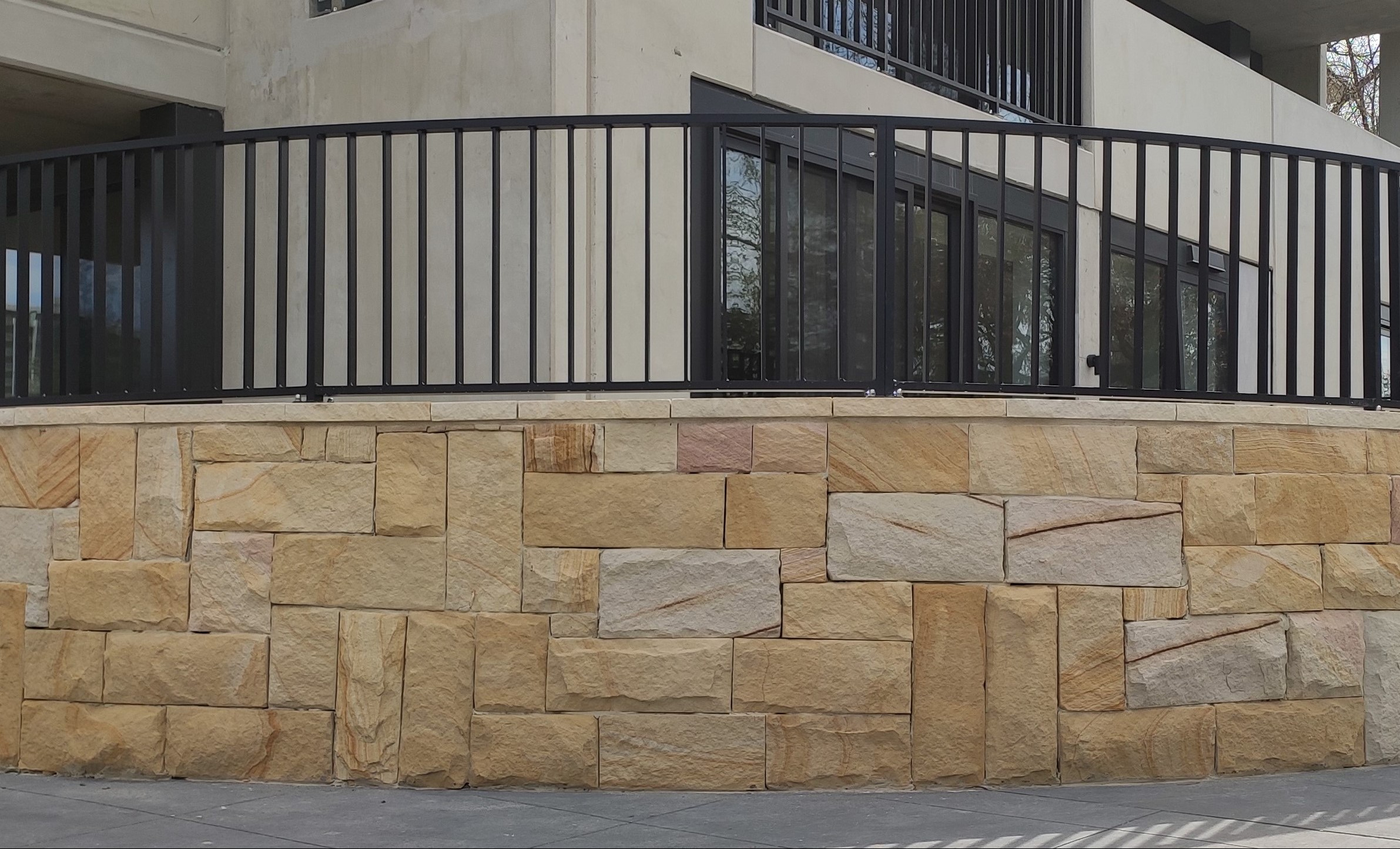 Colonial Banded sandstone cladding feature wall installation