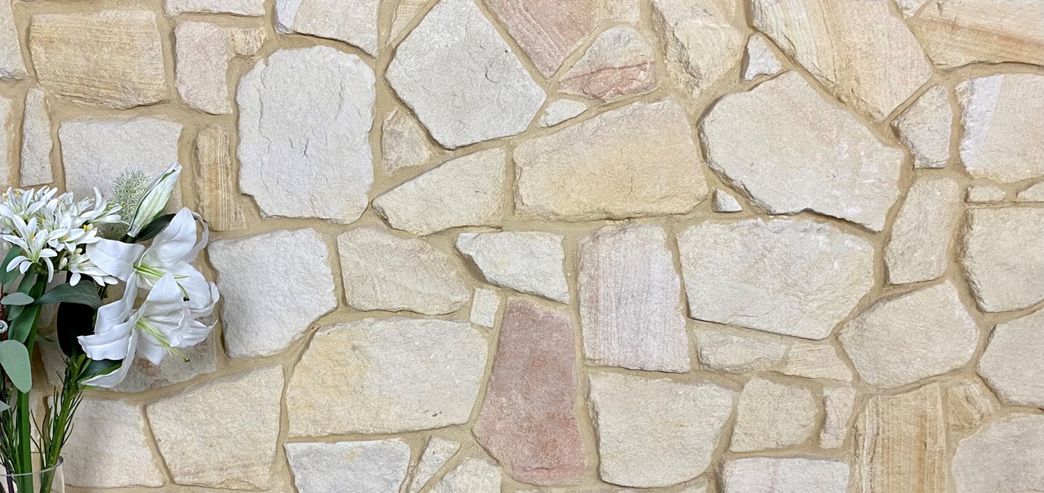 Banded irregular sandstone cladding showroom display