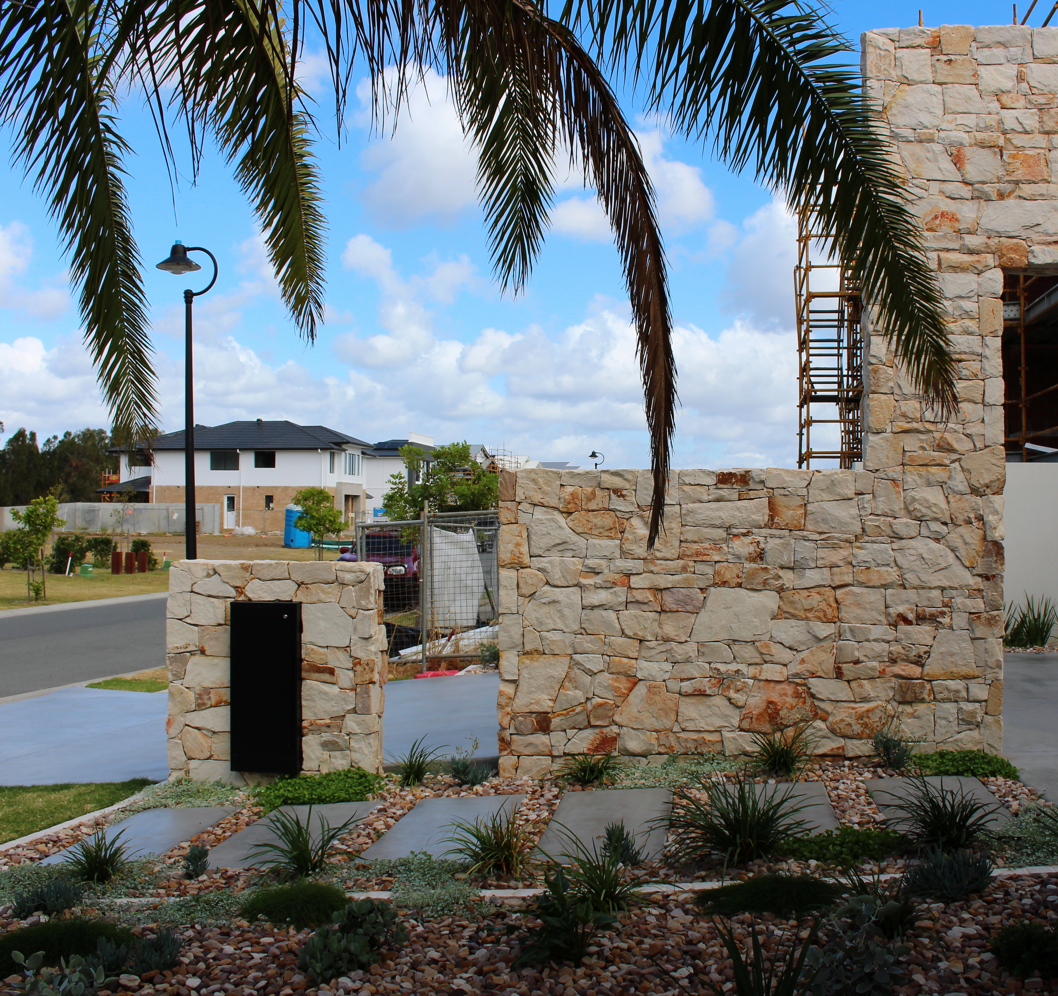 Irregular Burnie sandstone cladding exterior wall Gold Coast