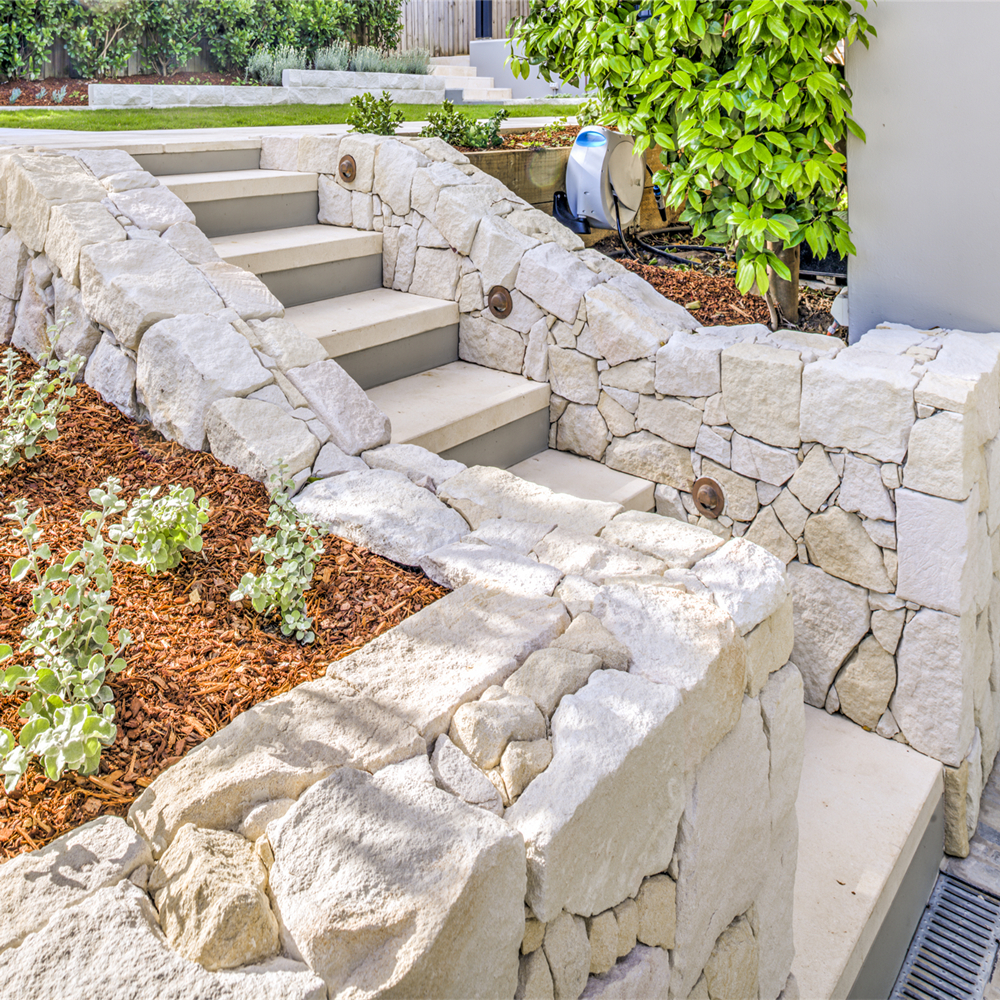 Foster irregular sandstone cladding Warrawee project