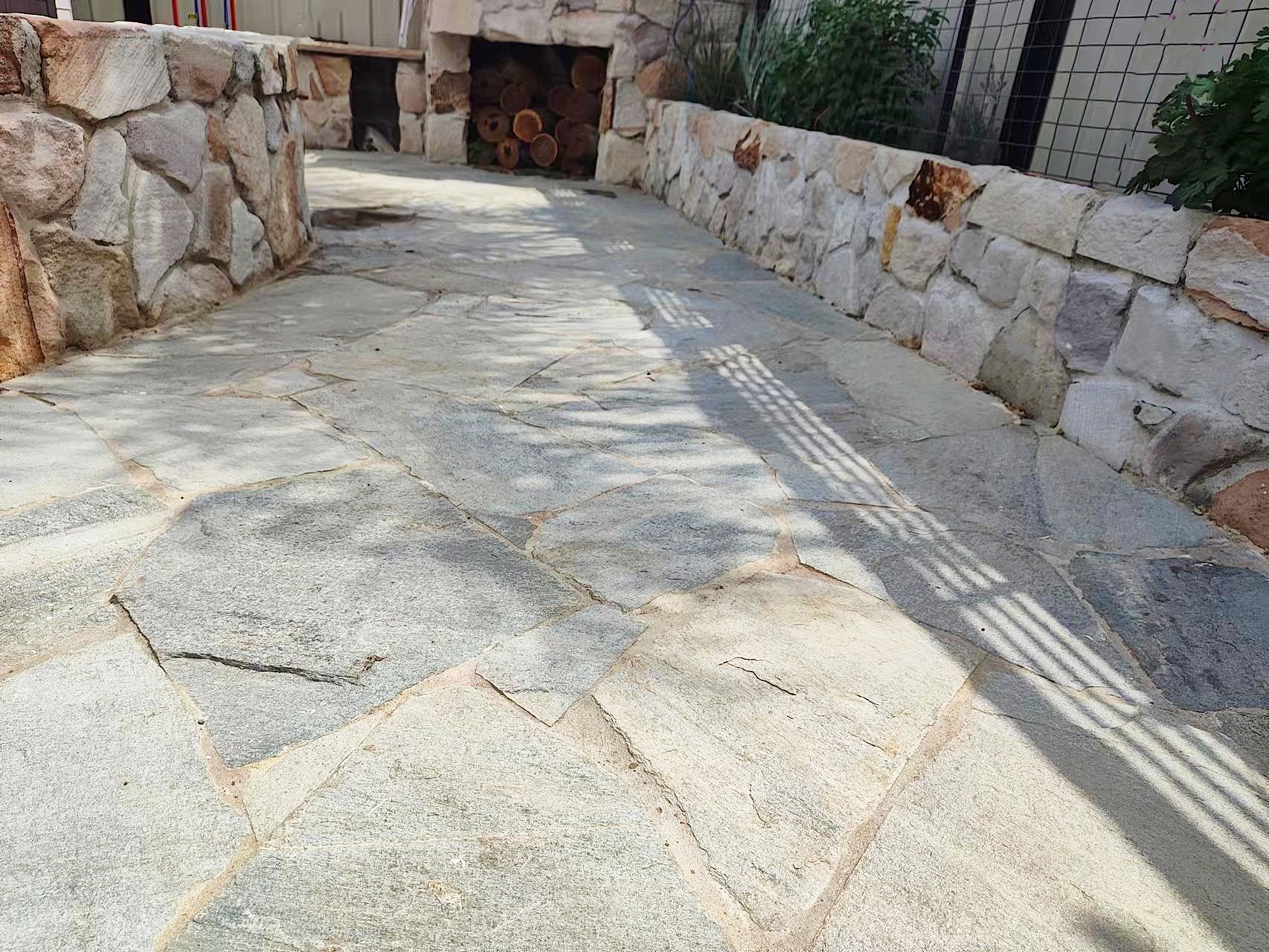 Loxton sandstone walling with crazy paving feature