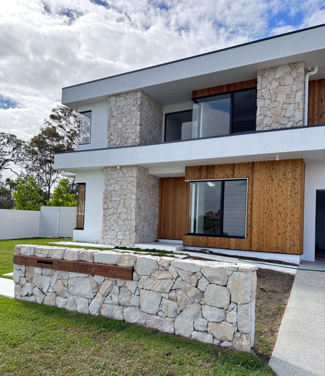 Irregular Ophir sandstone cladding installed wall Brisbane