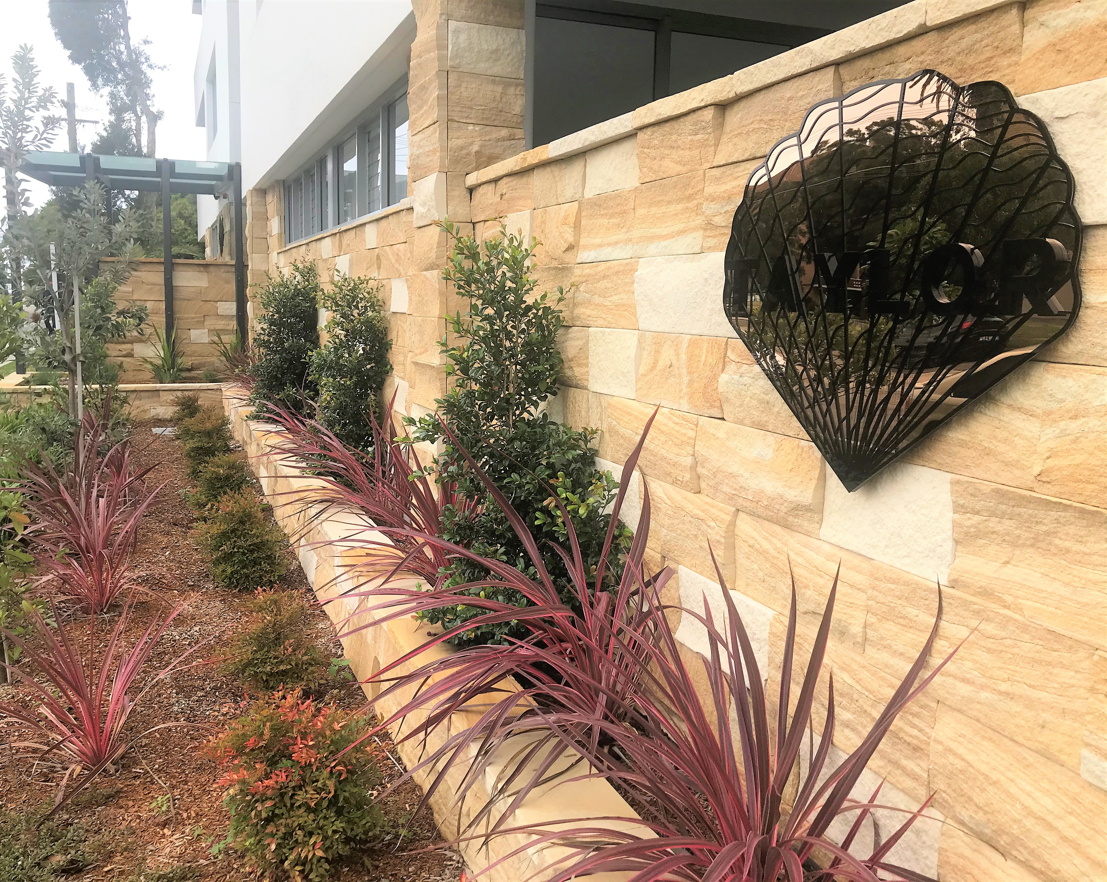 Kirra Banded sandstone cladding installed feature wall