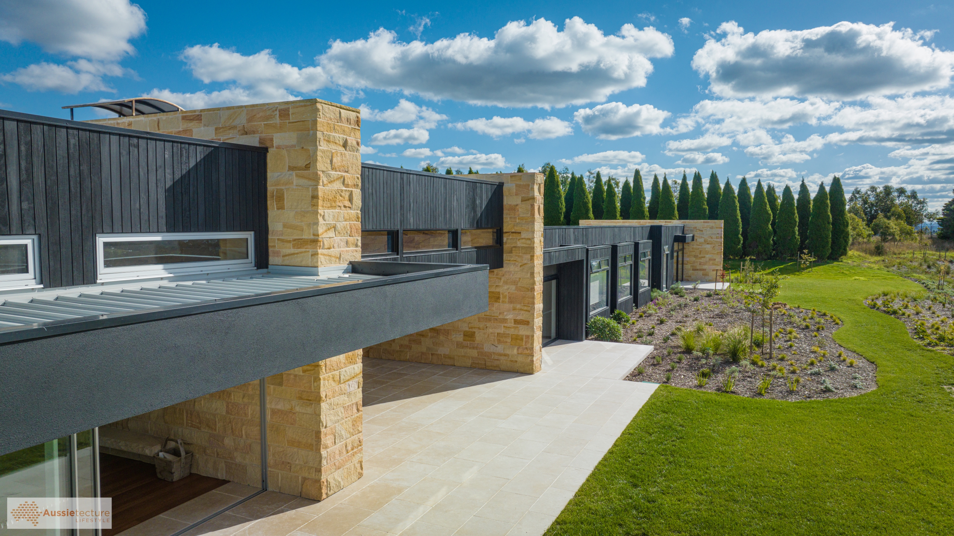 Kirra Banded sandstone split face cladding project