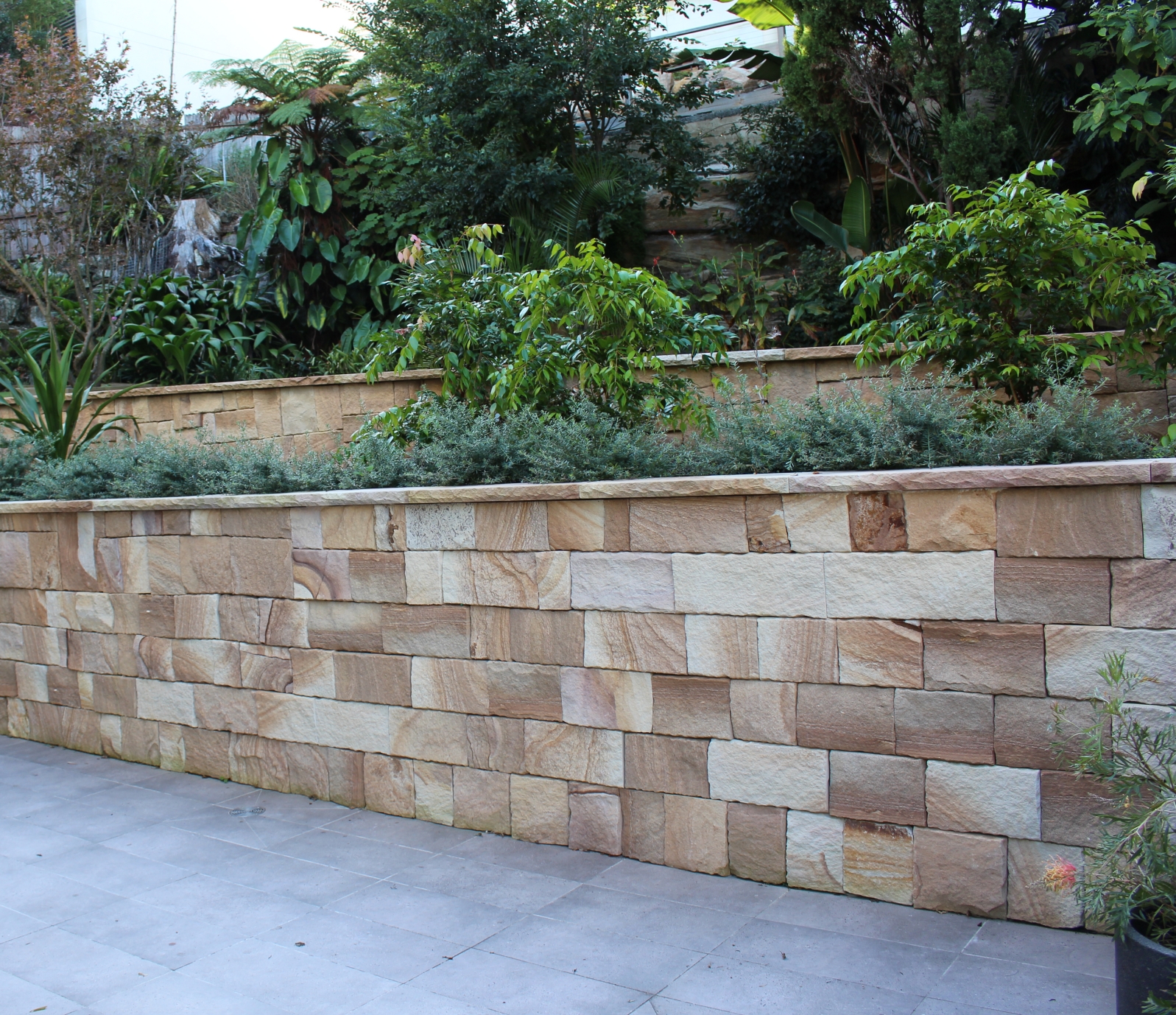 Kirra Ranch sandstone cladding on retaining wall Brisbane