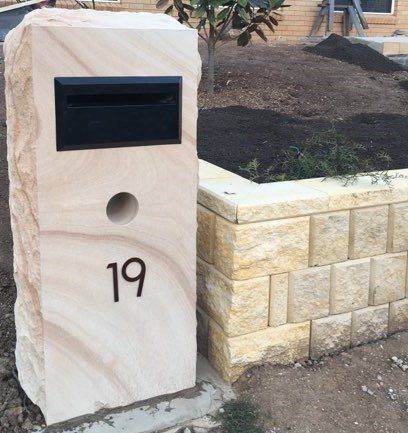 Rockfaced sandstone letterbox with natural edge finish Brisbane