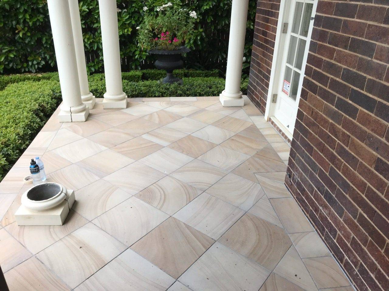 Natural sandstone paving tiles for pool surrounds Gold Coast
