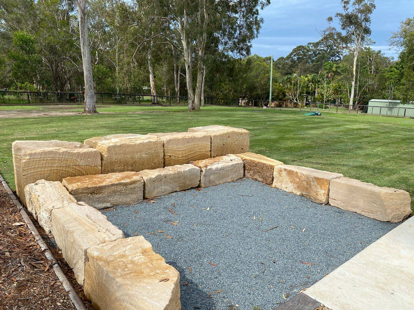 B Grade 2-4 sawn sided sandstone retaining wall blocks ready for retaining walls in Brisbane
