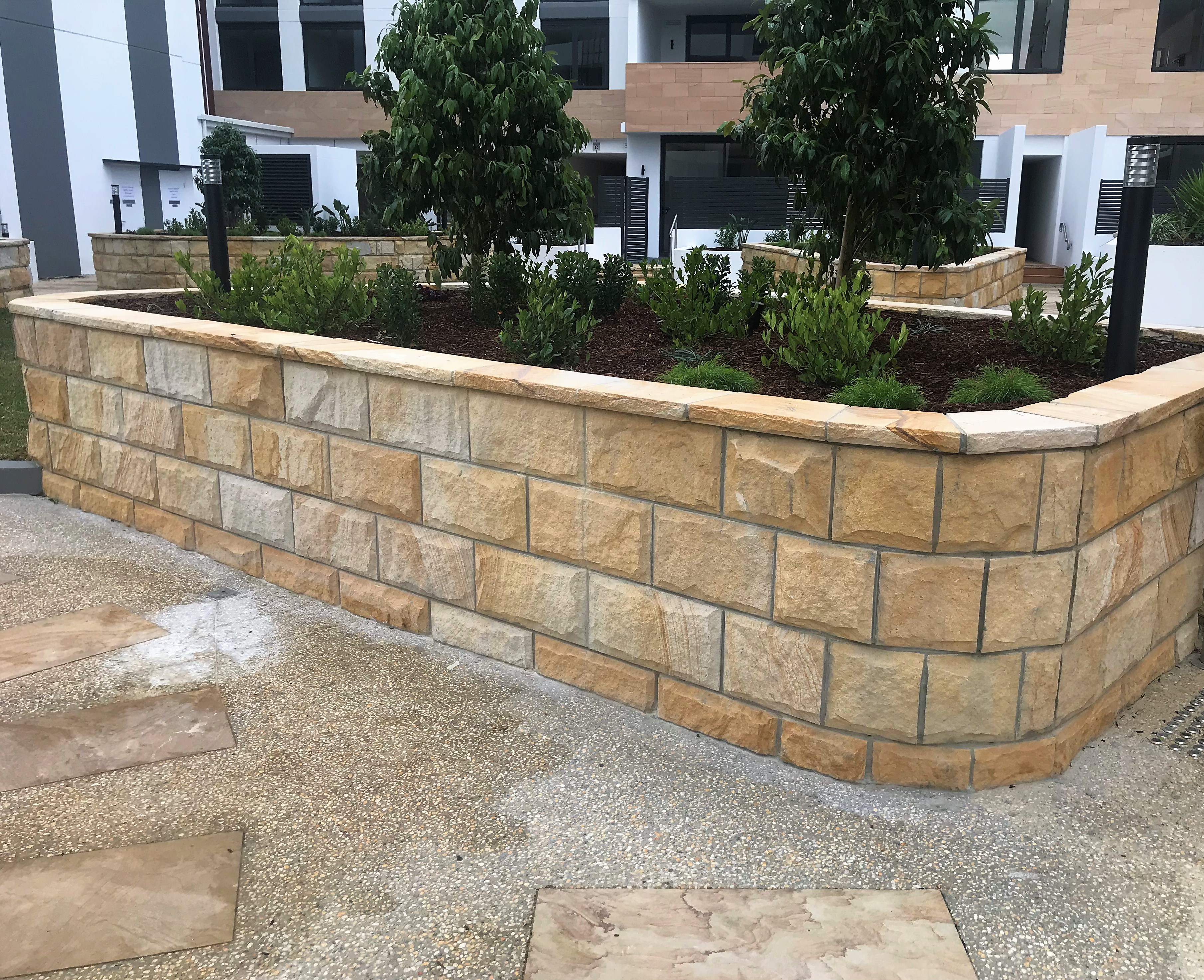 Rockfaced Banded sandstone cladding landscaping retaining wall