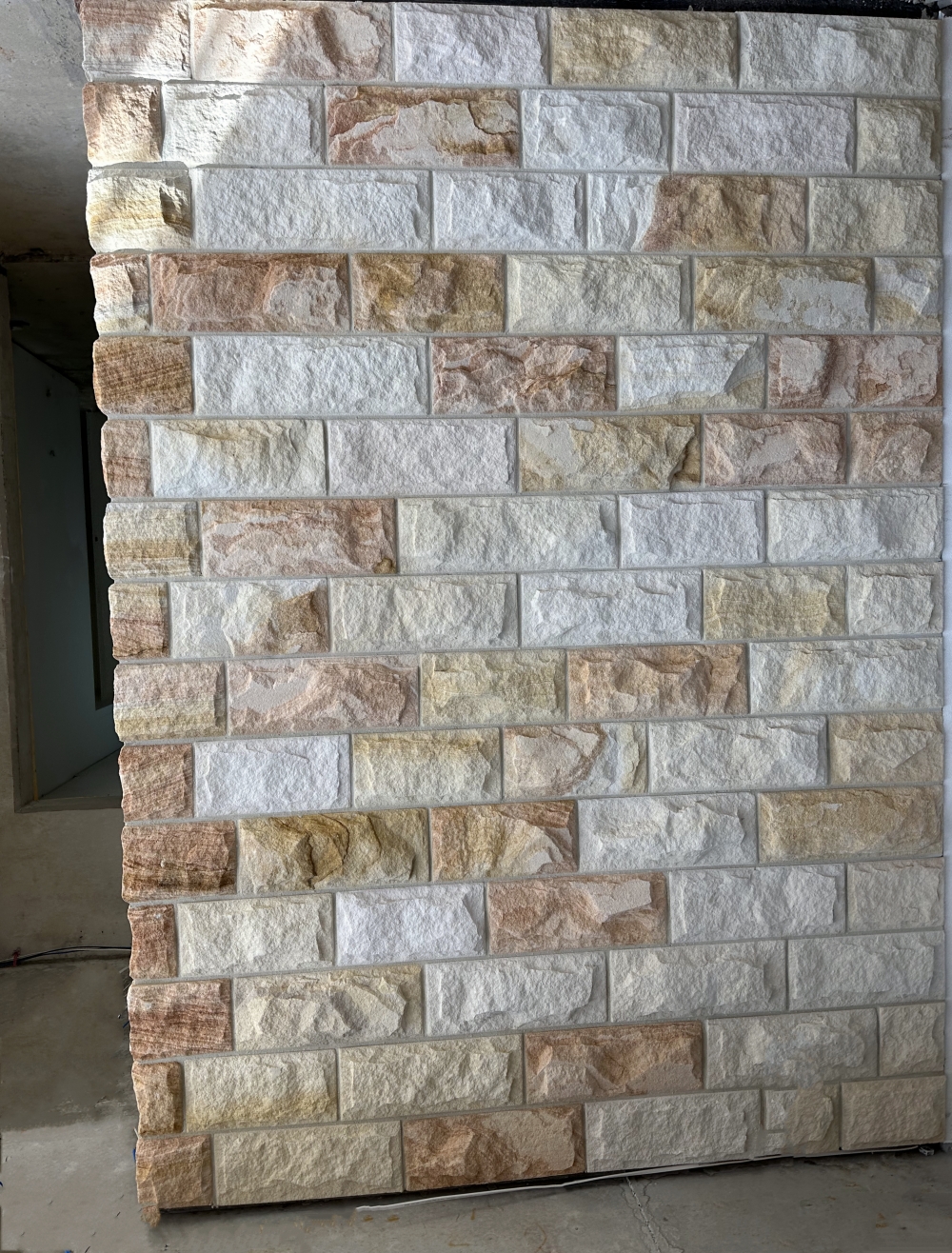 Rockfaced Ranch sandstone feature wall by Richard Crookes Constructions