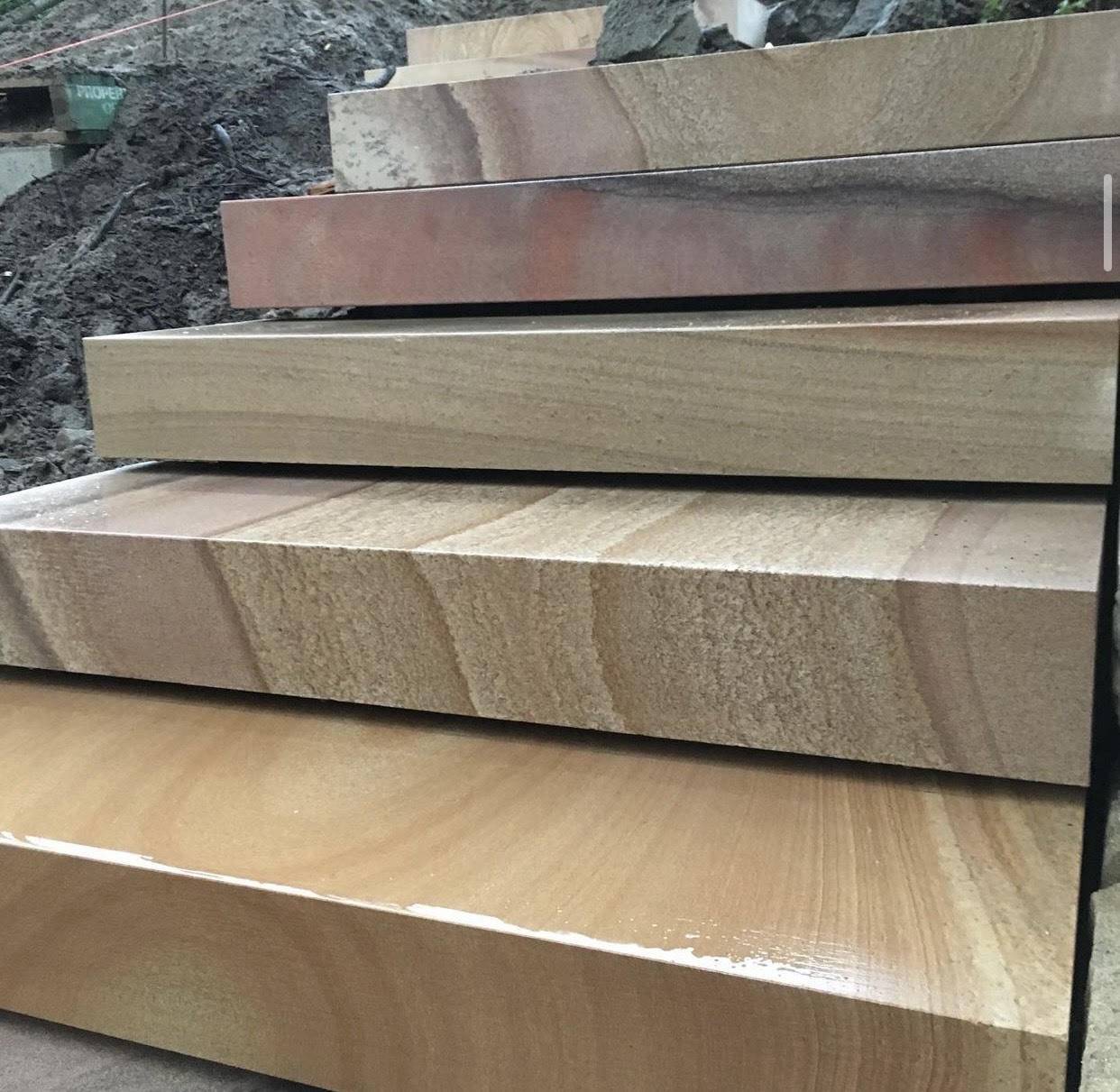 Diamond sawn sandstone steps customer installation Gold Coast