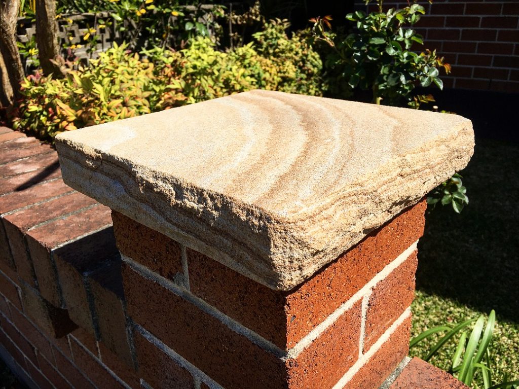 Australian sandstone capping on retaining wall Brisbane