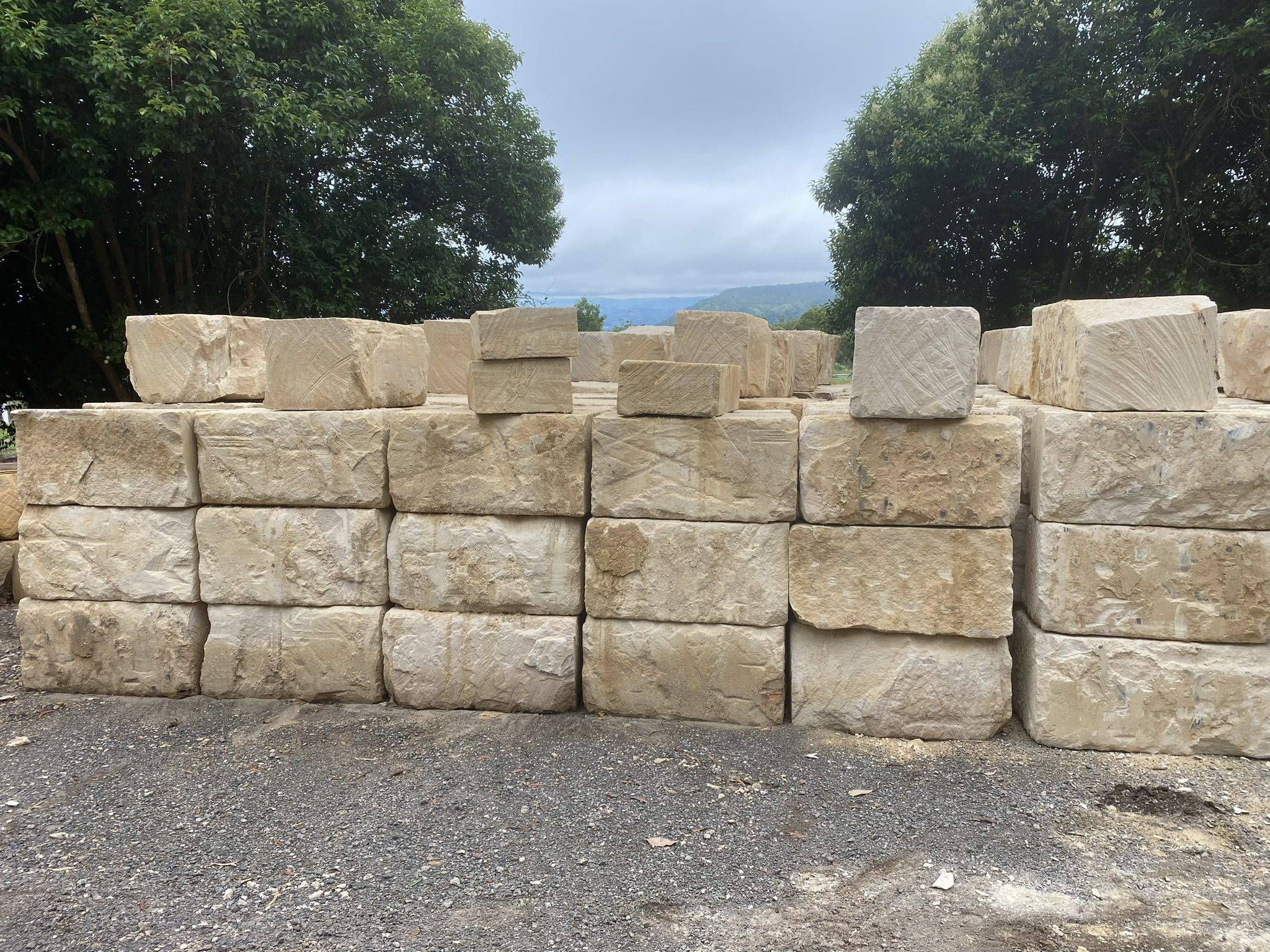 Quad sawn sandstone blocks on construction site Queensland